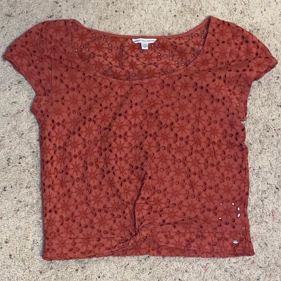 American Eagle Outfitters Tops - Cute burnt orange hole patterned top